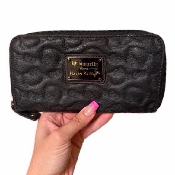 Loungefly Handbags - Loungefly Black Embossed Hello Kitty Wallet